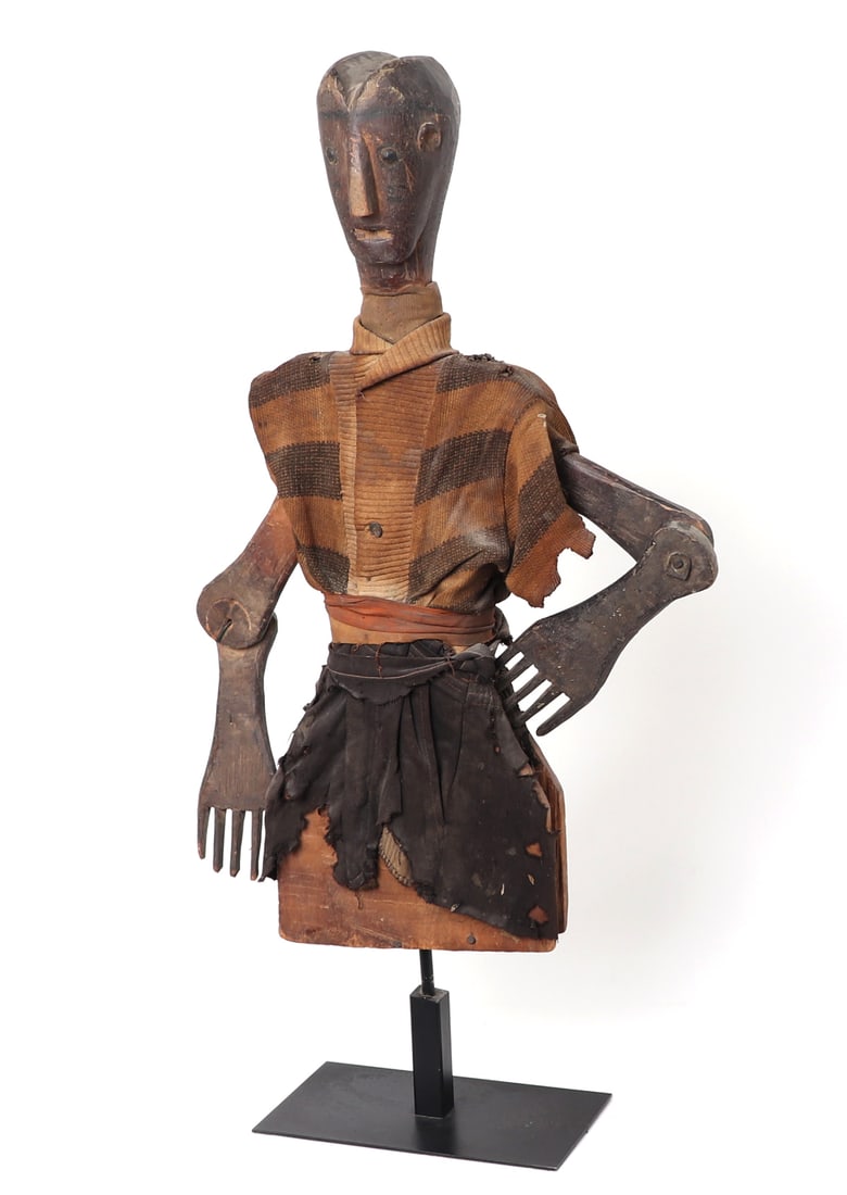 Bozo or Bamana Tribe "Marionette" Statue, Mali: West Africa, Mali, Bozo or Bamana peoples. Marionette Merekun wood statue on custom stand. Heart shaped head with an indent stylisticly carved into the figures head. Remnants of dark red pigment and b