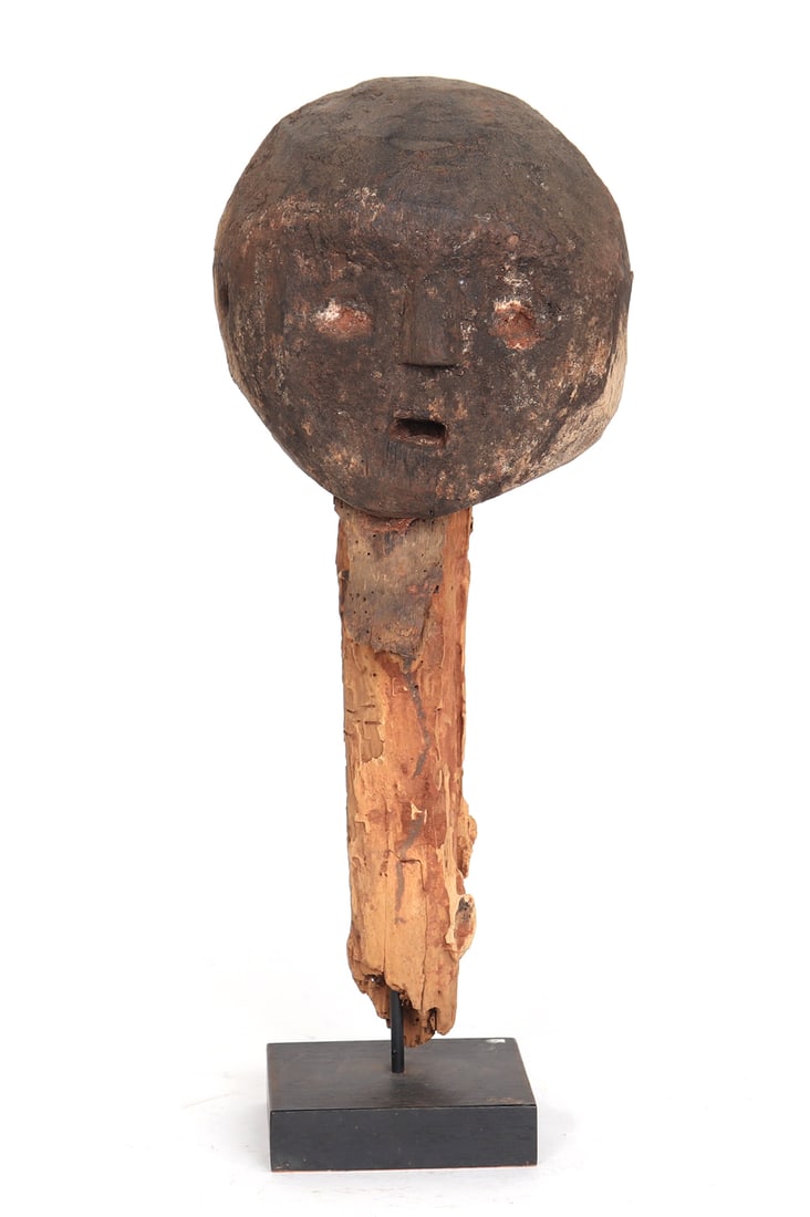 Boccio Voodoo Head Fragment, Fon Peoples 20th c.: Puppet head or fragment from a ceremonial figure with round circular skull agape mouth and tight facial features. The Bochio also spelled Boccio are well known type of carved objects from the Fon