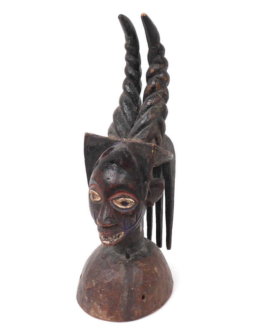 Yoruba Helmet Crest Head Piece, Nigeria: West Africa, Nigeria, Yoruba Peoples. Wooden helmet crest or headpiece that is pierced to the base for retention. The holes also appear to have use. Used as dancing masks or helmet crest depiction