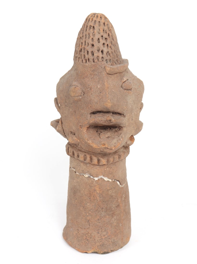 Koma Anthropomorphic Three-Faced Terracotta Head: West Africa, Ghana, Koma culture terracotta figure with three 'faces' each with mouth agape, almond slit eyes and pierced work headdress. Size 9 1/2" HFamily collection of an esteemed diplomat and amb