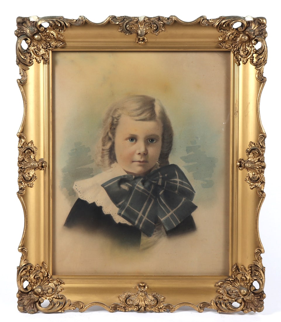 Antique Pastel of a Young Child: In an original antique gilt frame, this piece immediately draws you straight in, first catching the bright blue eyes staring out at the artist, we are then moved around to the pastel colors in a halo