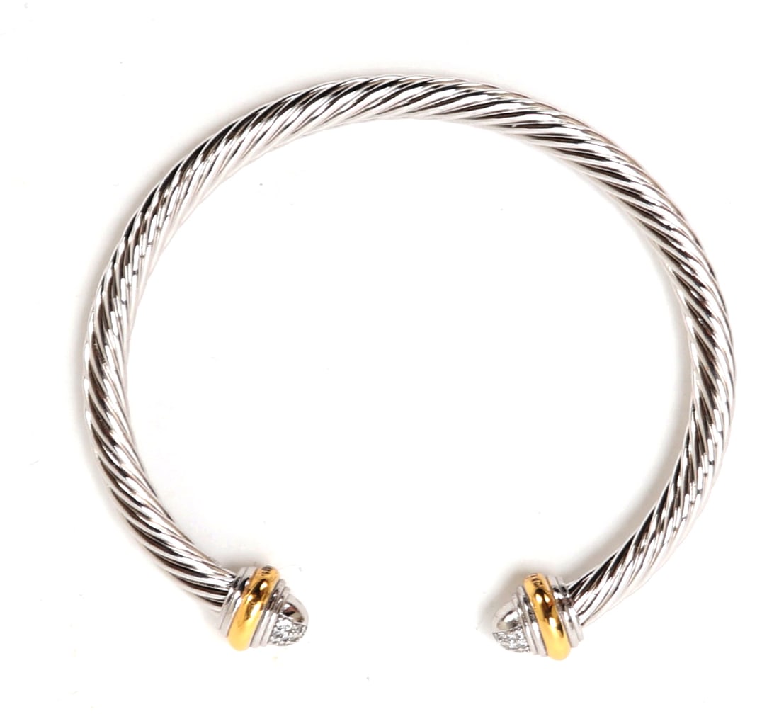 Gorgeous David Yurman Style Bracelet: Wonderful David Yurman style bracelet in a twisted rope form with diamond style finials and gilt rings. Marked to the interior of the finials. Size 2 3/8" W