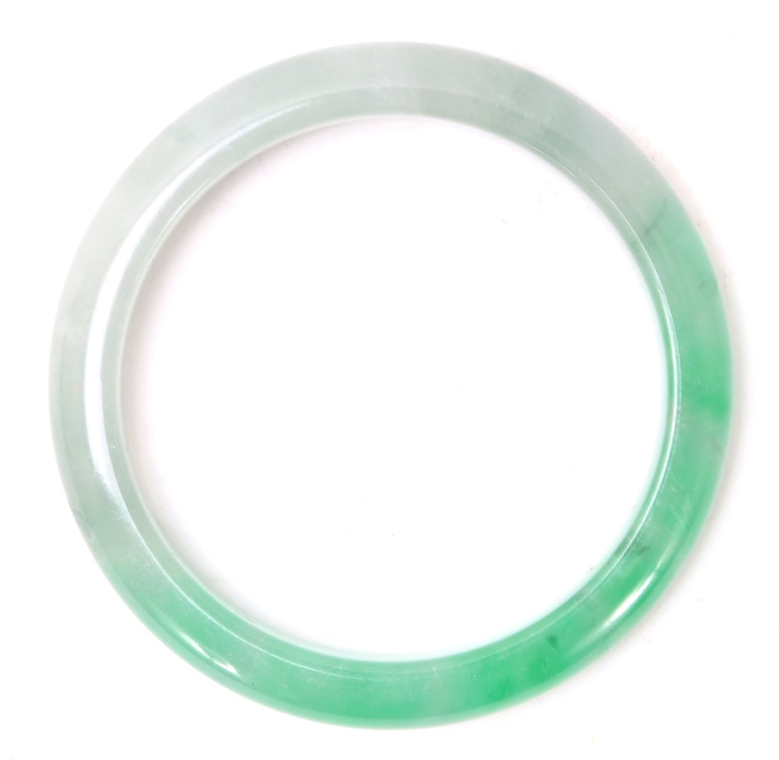 Gorgeous Light Green Chinese Jade Style Bangle: Beautiful light green Chinese jade style bangle with lovely translucency when held to natural light. Size 2 1/4" W