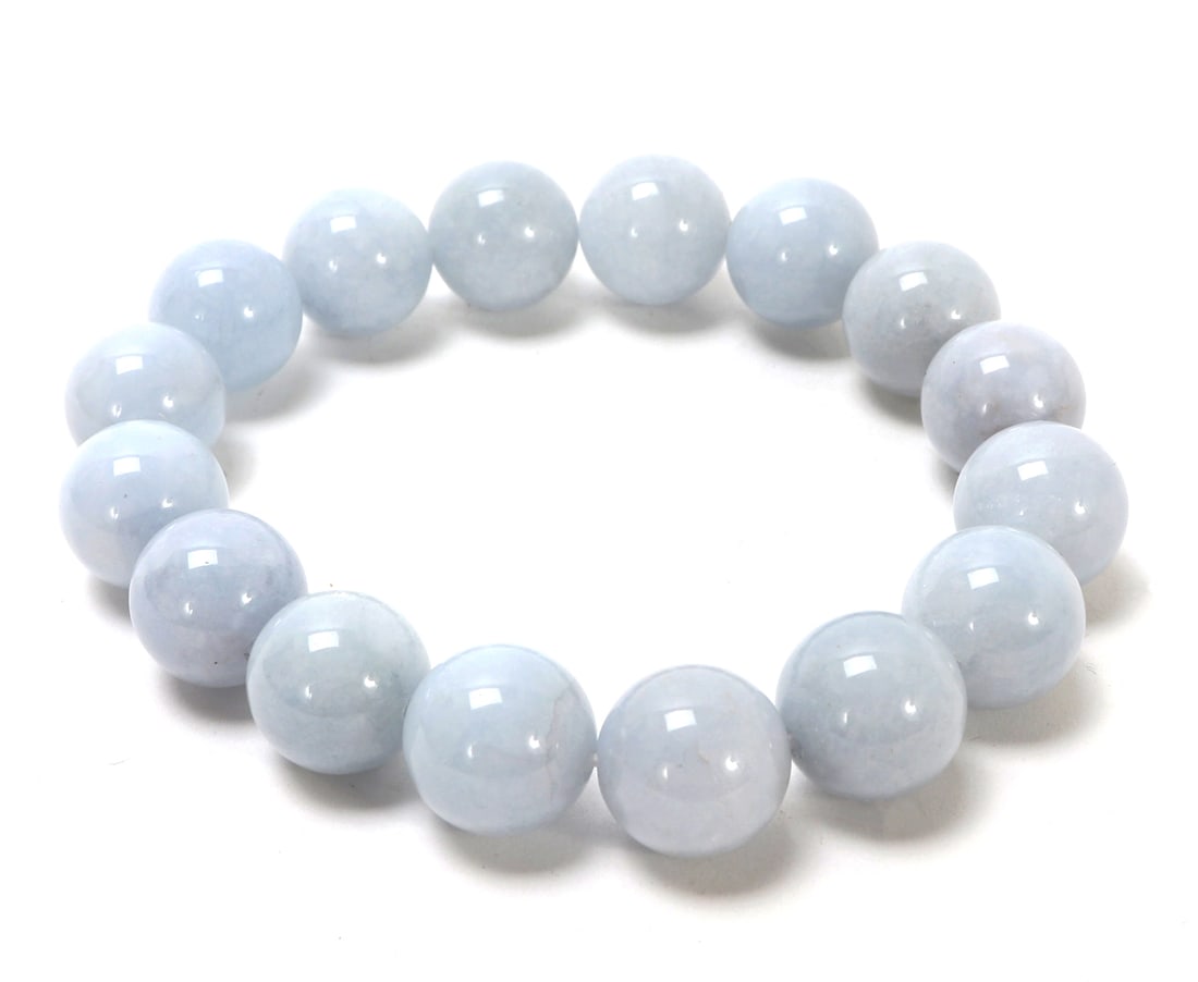 Natural Aquamarine Beaded Bracelet: Beautiful all natural aquamarine beaded bracelet with light blue clouded wisps throughout. Polished smooth for easy wear. Size 2 1/8" W
