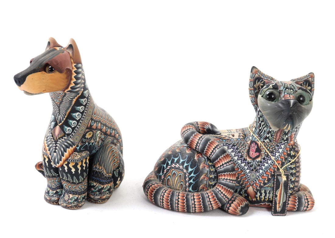 Two Wonderful Handmade Polymer Clay Figures by Jon Anderson: Adorable group lot of two hand made and intricately detailed polymer clay figures. One depicted as a regal wolf with bright orange and yellow highlights throughout. The other a recumbent cat with a