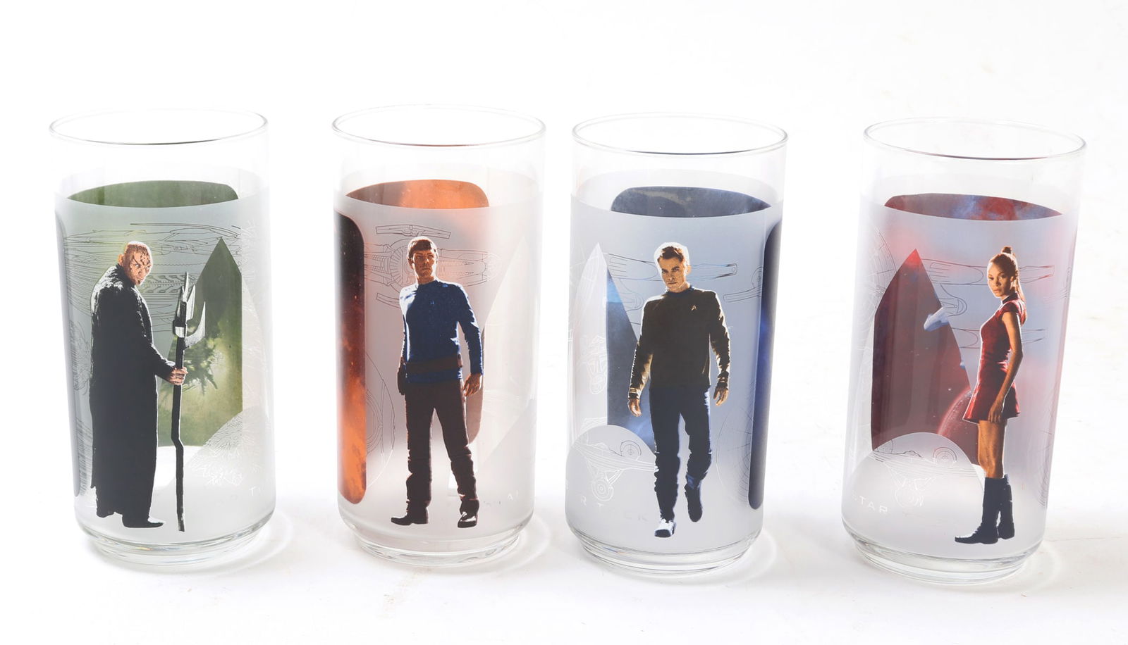 Set of Four Collectable Star Trek Glasses: Nice original collection of vintage Star Trek glasses including Spock, Nerom Kirk and Uhura. Including original boxes for each glass. Size 5 3/4" H