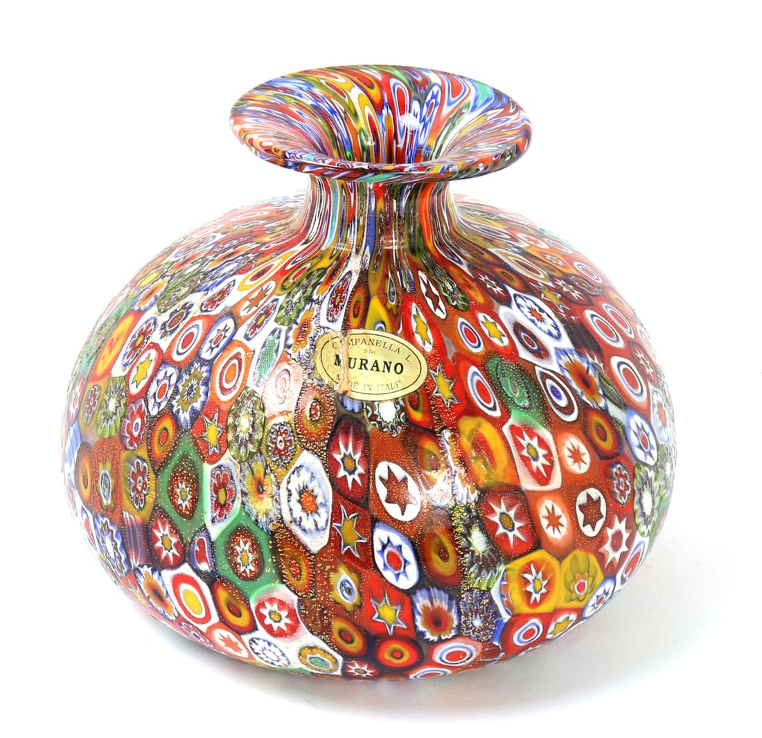Gorgeous Original Murano Millefiori Vase: Beautiful hand blown glass vase made in Italy in vibrant bright colors throughout. Hand crafted floral designs decorated the entirety of the vase. Big bulbous body with squat narrow corseted neck,