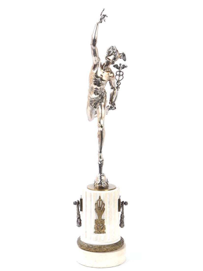 Wonderful Silvered Bronze Statue of Mercury on Marble Base: Finely crafted silvered bronze statue depicting Hermes (Mercury), the classical messenger god, poised atop a slender column rising from the open mouth of a realistically sculpted human face. Hermes is