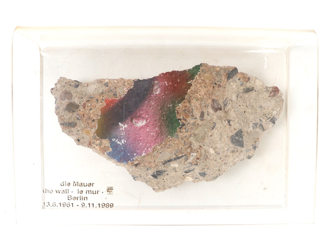 Beautiful Original Section of the Berlin Wall: Nicely mounted section of the ancient Berlin wall with pigments in pink, blue, red, green and brown still remaining throughout. Size 6 3/4" L, Weight 2 lb. 0.6 oz