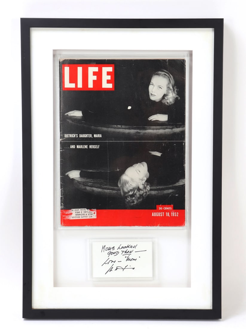 Life Magazine of Marlene Dietrich & Daughter Maria, 1952: Framed copy of the original August 18, 1952 Life magazine publication of Maria Riva and her mother Marlene Dietrich. A personally signed card included in the framing below the magazine. Size 24 3/4"