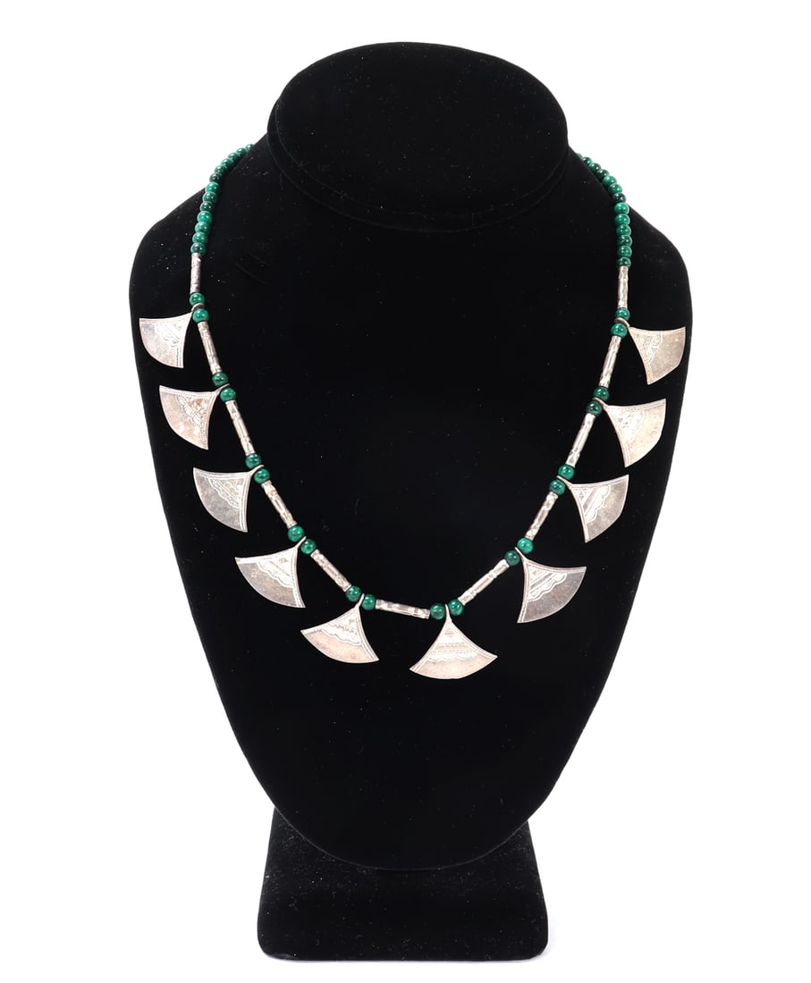 Tuareg Silver & Malachite Necklace: Wonderful necklace with triangular silver pendants and beads spaced with malachite beads in-between. Tuareg jewelry, malachite is thought to ward off evil, offer protection, and bring good fortune wh