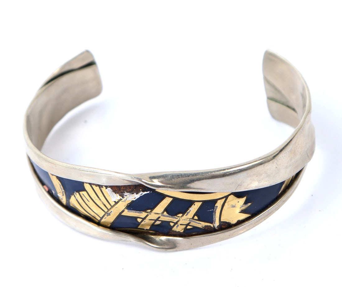 Beautiful Unique Handmade Openwork Bracelet: Absolutely beautiful craftmanship and creativity went into the making of this lovely cuff bracelet. Giving a unique appearance of being pealed away, one piece of sterling silver is manipulated in a