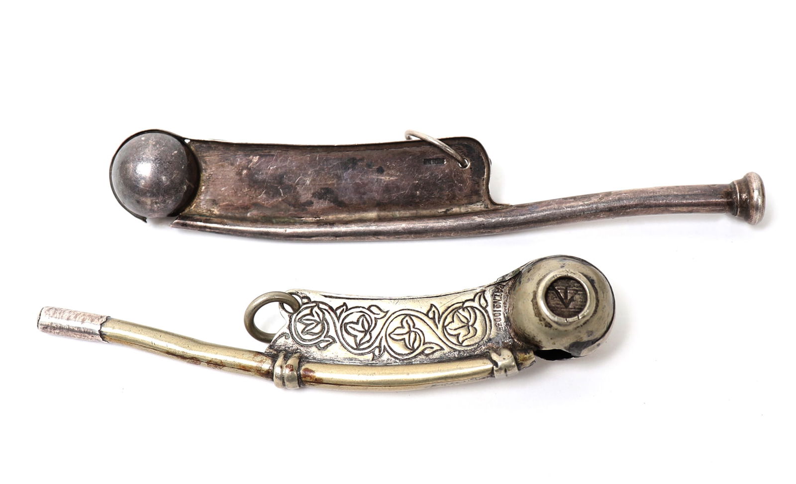 Two Bosun Whistle, One Sterling British Navy: Early 1900 rare Royal Navy bosun's whistle together with another silver bosun whistle. Size of largest 5 1/2" LEx-Arizona Collection, Ex-Arizona State Fair