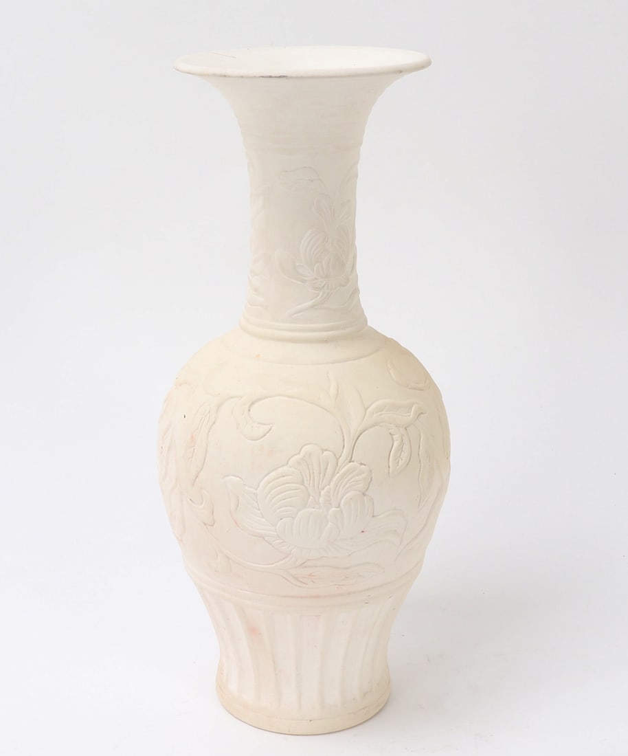 Chinese Porcelain Vase with Flowers in High Relief: Chinese white porcelain vase with chrysanthemums in high relief with leaves and stems throughout. Bulbous body with long narrow neck and flared rim. Size 13 3/8" H x 6" W