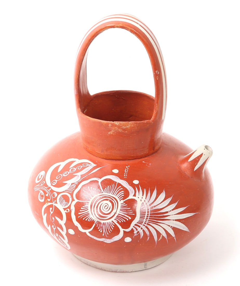 Mexican Ceramic Painted Pulque Pitcher: Mid-20th century, possibly from Michoacan. Red slip pitcher with tall arched handle, small protruding spout and large bulbous body. Lovely painted floral and leaf designs with slight raised pedestal