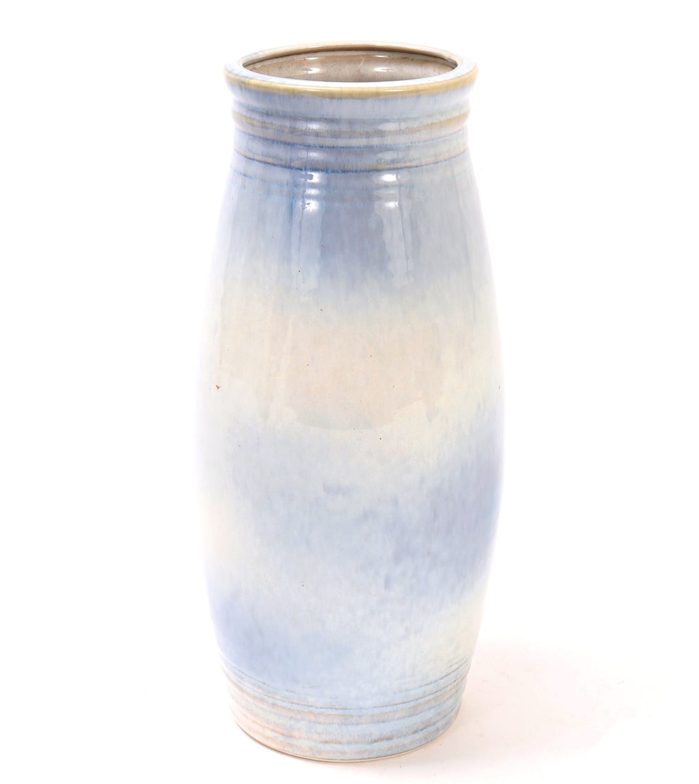 Chinese Purple & Cream Glazed Vase: Chinese porcelain glazed vase in a lovely light purple and cream glaze throughout. Oblong cylinder shape with a ribbed neck and slightly flared rim. Size 10 3/4" H, weight 2 lb.