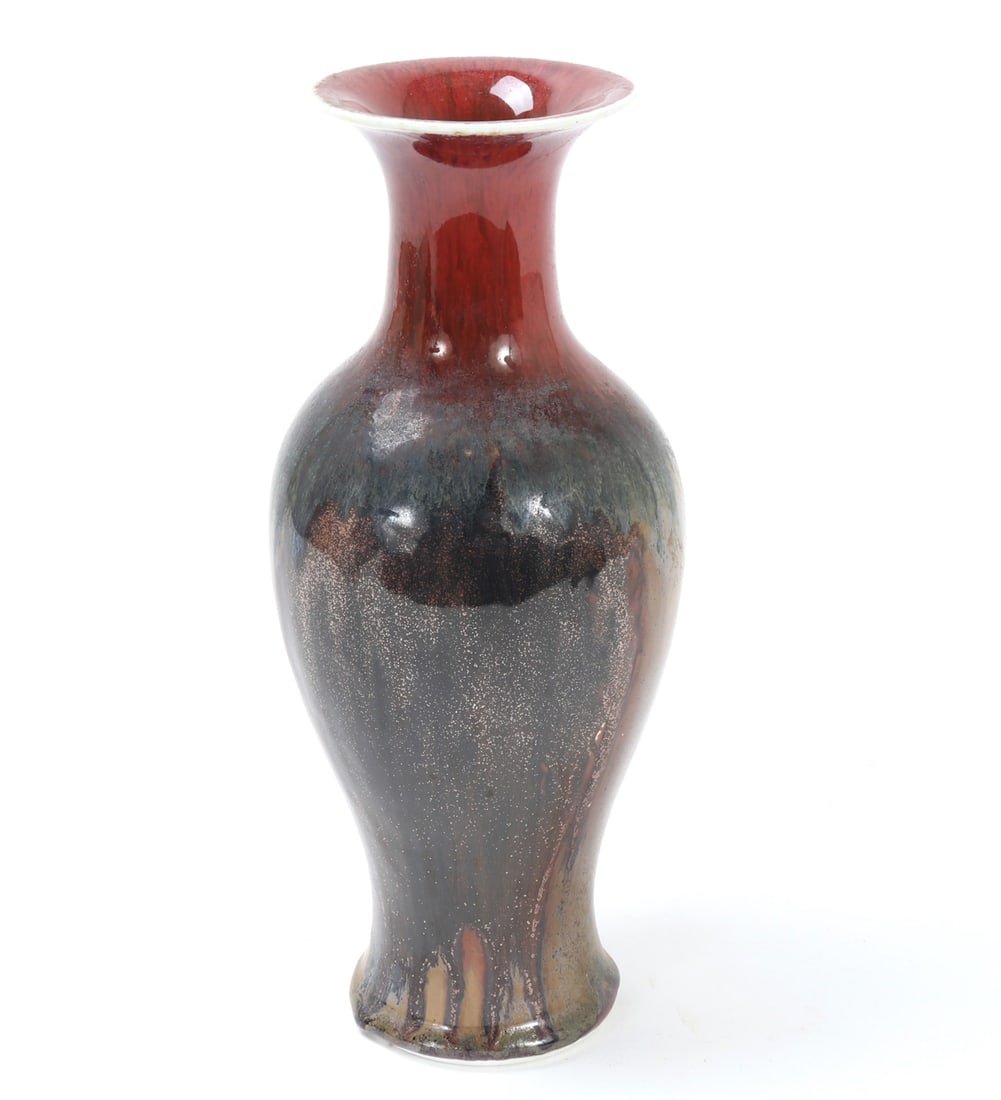 Chinese Multicolored Porcelain Vase: Beautiful Chinese multicolored glazed vase with a beautiful deep red underglaze, blue, green and yellow overglaze throughout. Signed to the base. Size 11 3/8" H, weight 982 g
