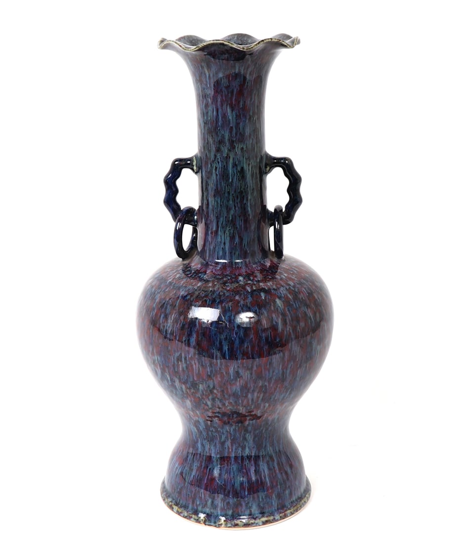 Chinese Drip Glaze Blue & Purple Vase: Lovely deep blue and purple drip or splash glazed vase with imitation rings attached to bamboo style handles. Scalloped rim with long narrow neck leading to a hourglass body, unglazed base. Size 17