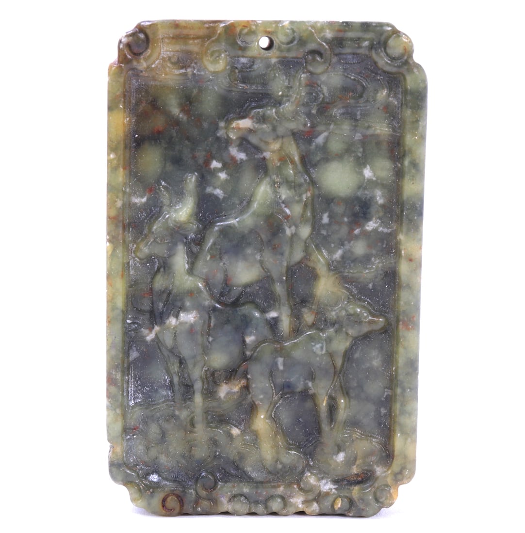Beautiful Chinese Mottled Jade Style Stone Plaque: Beautiful mottled green jade style pendant depicting deer standing along a mountain, beautiful details framing the three deer in the center. Drilled to the top for suspension. Size 2 3/4" L x 2 1/4"