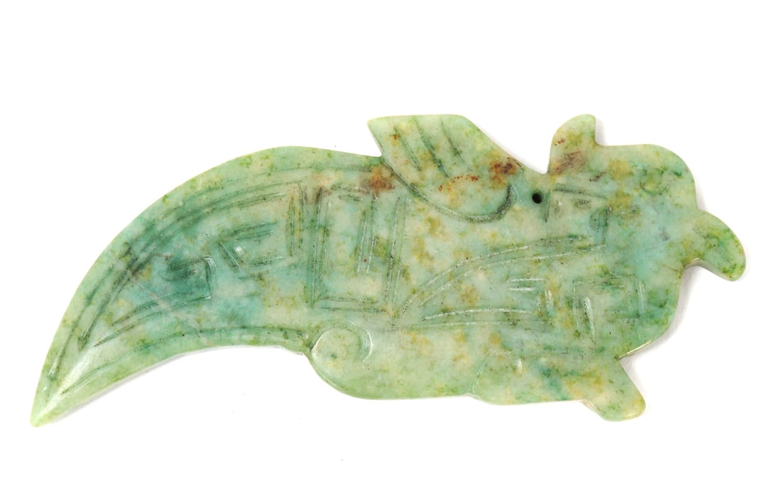 Very Nice Chinese Jade Style Bird Pendant: Lovely light green jade style bird shaped pendant with incised geometric designs to the body. Pierced at the neck for suspension with big bulbous eyes, pointed tail. Size 4 3/4" L x 2 1/4" W