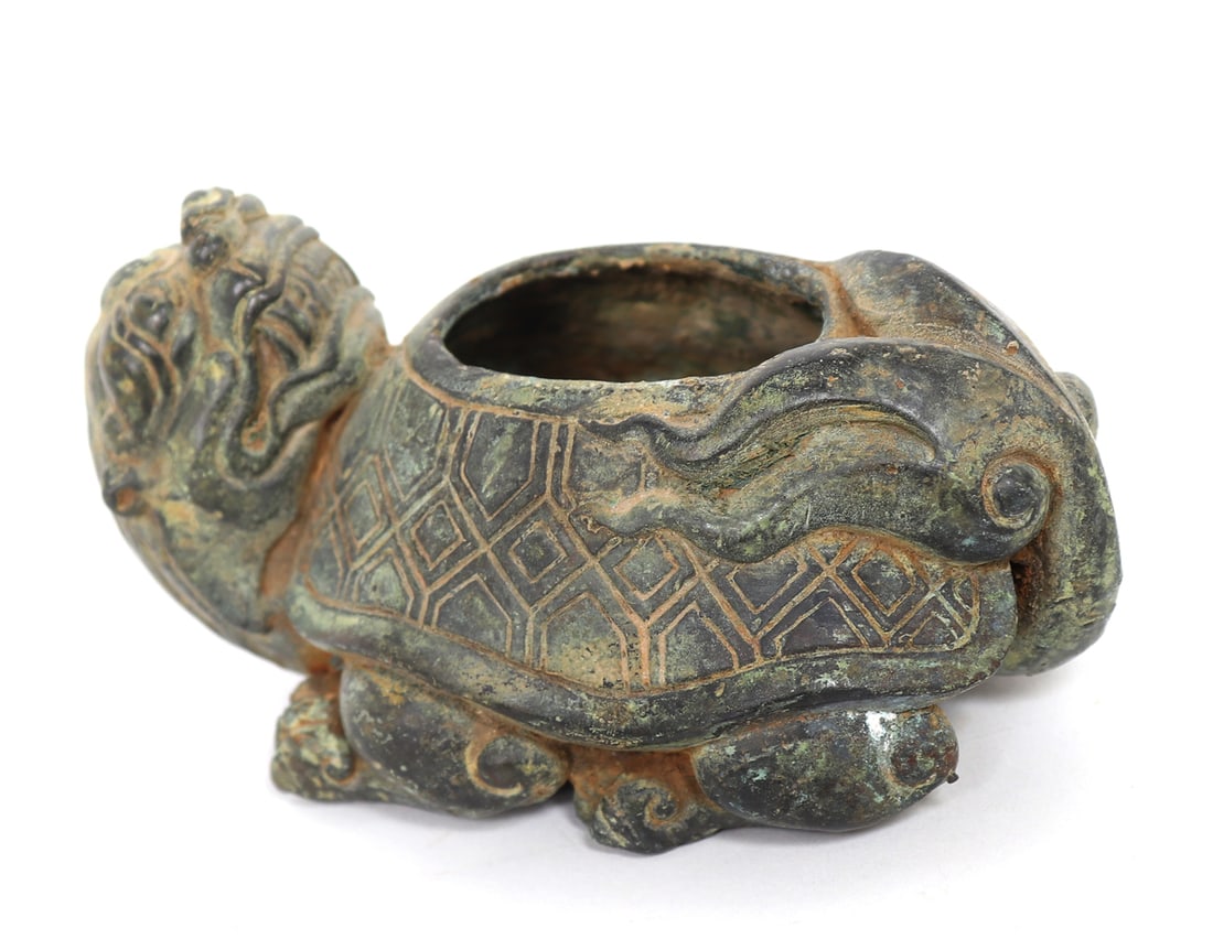 Chinese Bronze Archaic Style Bronze Turtle Dragon Vessel: Finely cast bronze Chinese archaic style bronze miniature turtle dragon vessel with hollowed belly. Dragon face and feet with claws, with a tortoise or turtle shell, and dragon tail. Size 4 1/2" L x