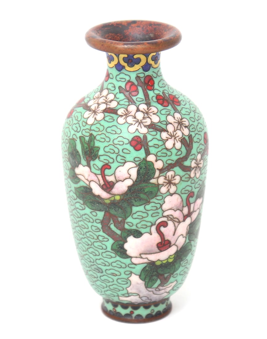 Chinese Miniature Cloisonne Vase: Small Chinese cloisonne vase with green background, yellow border detailing at the neck, and blooming pink flowers throughout. Size 4"