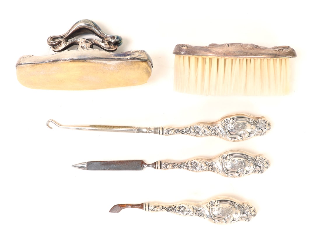 Early 1900's Sterling Silver Shoe & Nail Kit: Lovely set of five pieces of sterling silver utilities including a shoe brush, polisher and shoe hook. Nail file and a cuticle treating tool. Each piece marked with sterling silver marks, date June