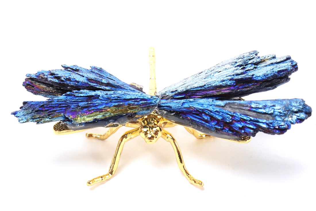 Gorgeous Blue Tourmaline Winged Dragonfly: Beautiful blue tourmaline dragonfly with gold colored body. Bright iridescence throughout with rainbows of colors throughout. Size 3 3/8" W x 21/8" H
