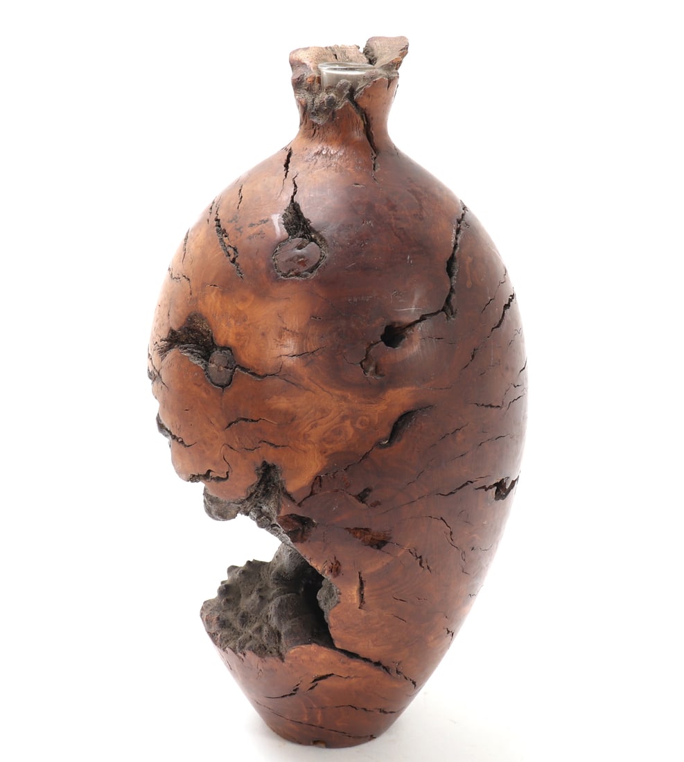 Gorgeous Burl Wood Carved Vase: Beautiful hand carved and shaped burl wood vase with a glass flute interior, slight flared rim and lovely maple coloring throughout. Size 7 3/4" H x 4" W