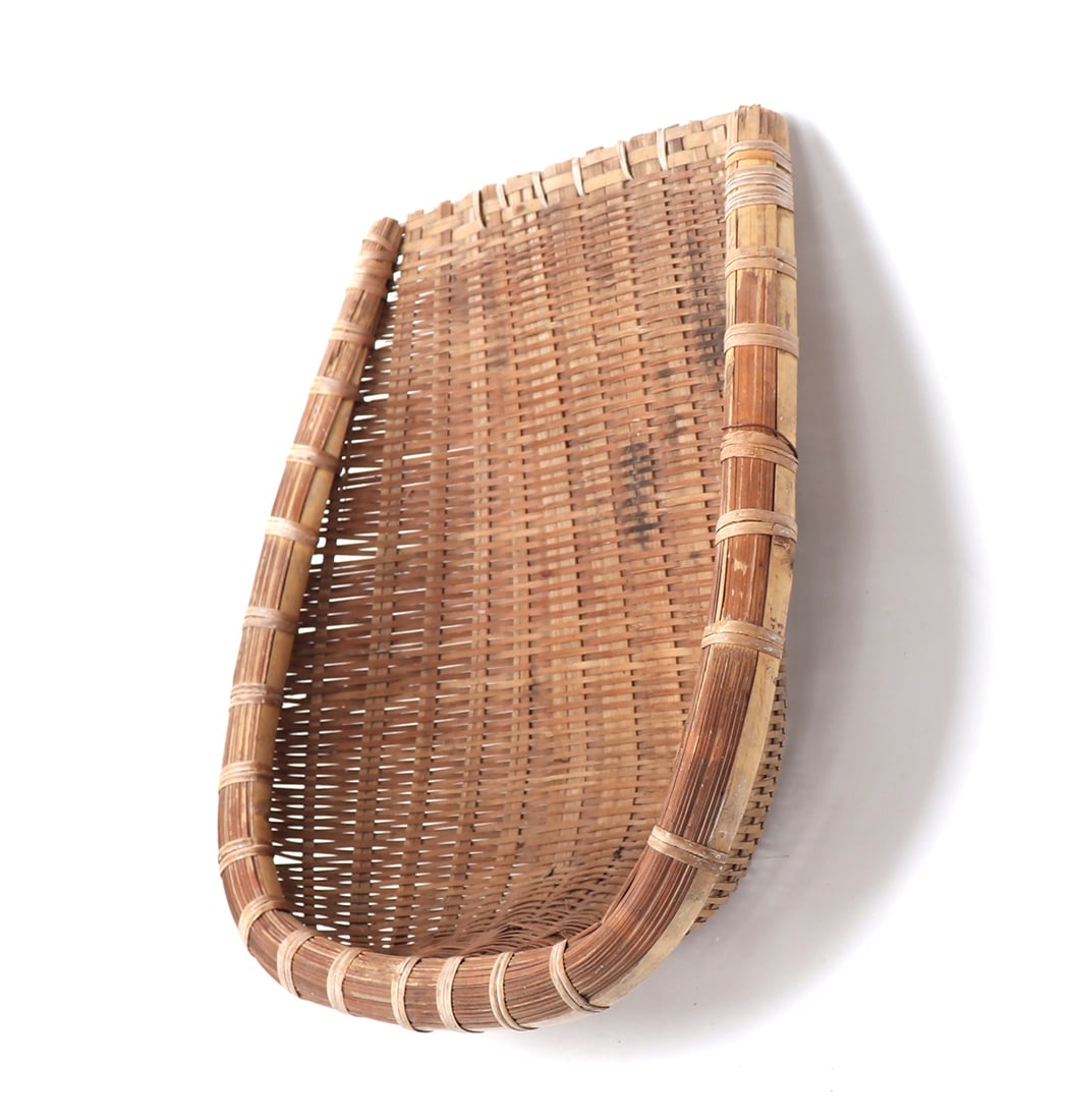 Vintage Japanese Bamboo Winnowing Basket: Vintage Japanese bamboo winnowing basket used by artisans and farmers to separate grain. Size 19" L x 15" WCollected prior to 2008, ex-Lacy Gallery (Vanna & Lee Lacy collection), Los Angeles CA. Lacy