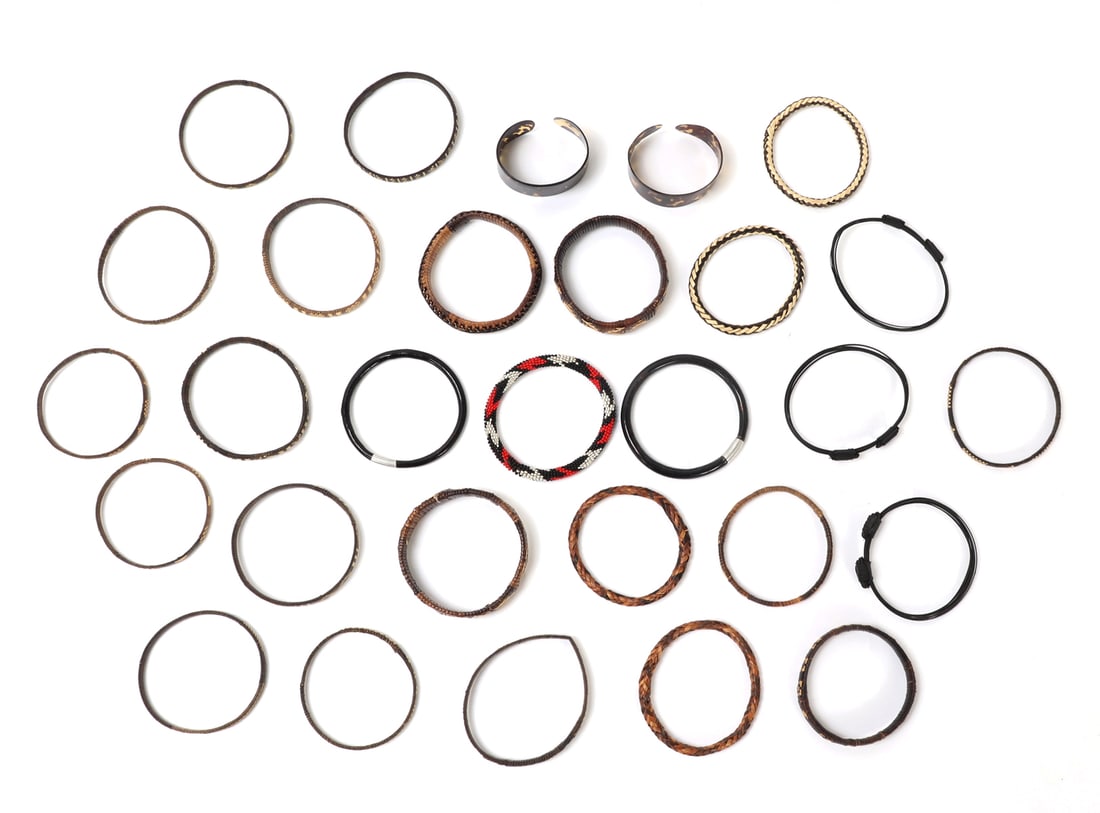 29 Wonderful Handmade Bracelets, Philippines: Wide variety of original vintage bracelets comprised of rattan, beads, shell and more. Wonderful geometric designs throughout several of the examples shown. Size of largest 3 1/2" W