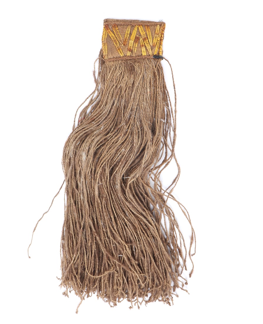 Filipino Rattan and Hide Sash: Unique Filipino rattan and hide sash showcasing intricate craftsmanship with natural fibers. The piece features a woven rattan band paired with long fiber fringe. Size 17" H