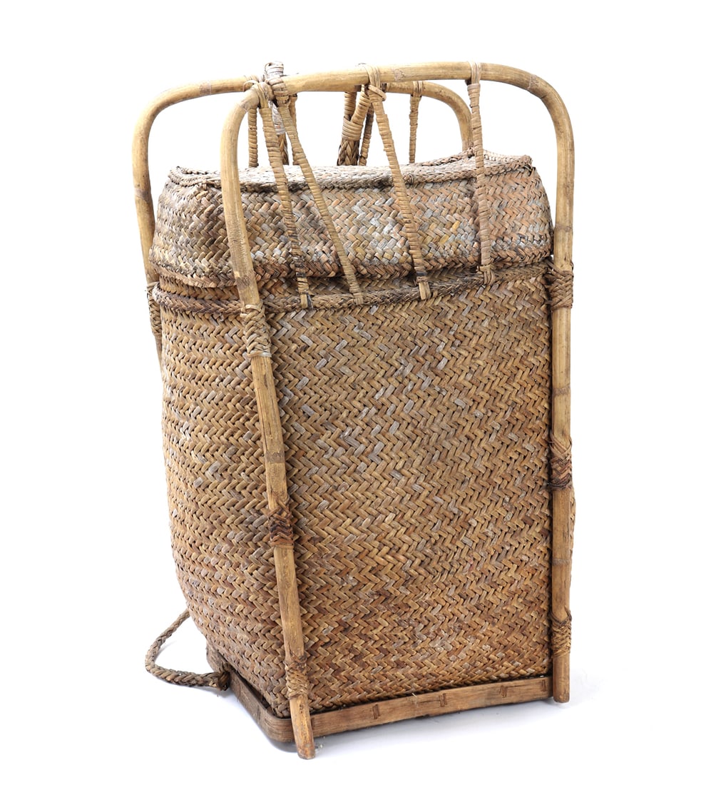 Antique Pasiking Ifugao Filipino Tribal Wicker Basket: Large antique hand braided Ifugao gathering basket made in the Philippines. Wonderful bamboo and rattan craftmanship throughout with a large basket cavity. Size 32" H