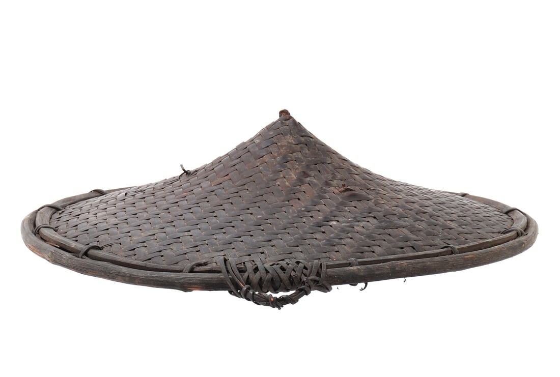 Nicely Woven Salakot, Philippines: Very nicely made handwoven rattan and bamboo salakot hat from the Philippines, with dark brown rattan strands intricately interwoven throughout. Size Brim 16 3/4" W, ID 7" W, 4 1/2" H