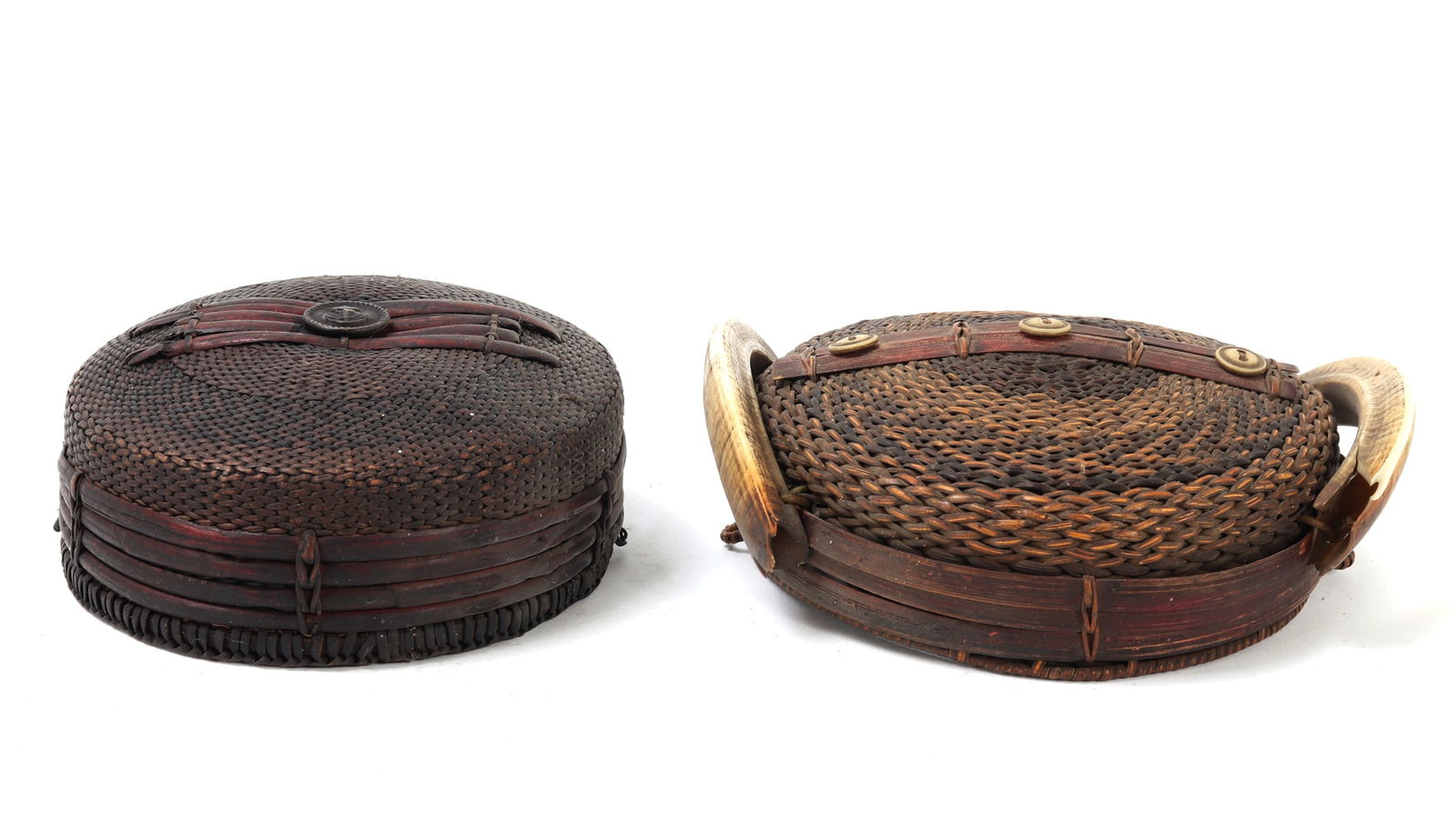 Group Lot of Two Fine Filipino Hats: Two fine vintage early Filipino hats comprised of rattan, bamboo, bone and boar. Left hat is intricately braided with bamboo banding to the exterior in repeating fashion, along with four bands of