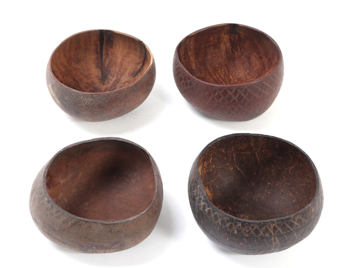 Group of Four Filipino Coconut Bowls: Nice group lot of four hand carved coconut bowls from the Philippines. Each with incised detailing throughout the exterior of each bowl. Size of each 6" W