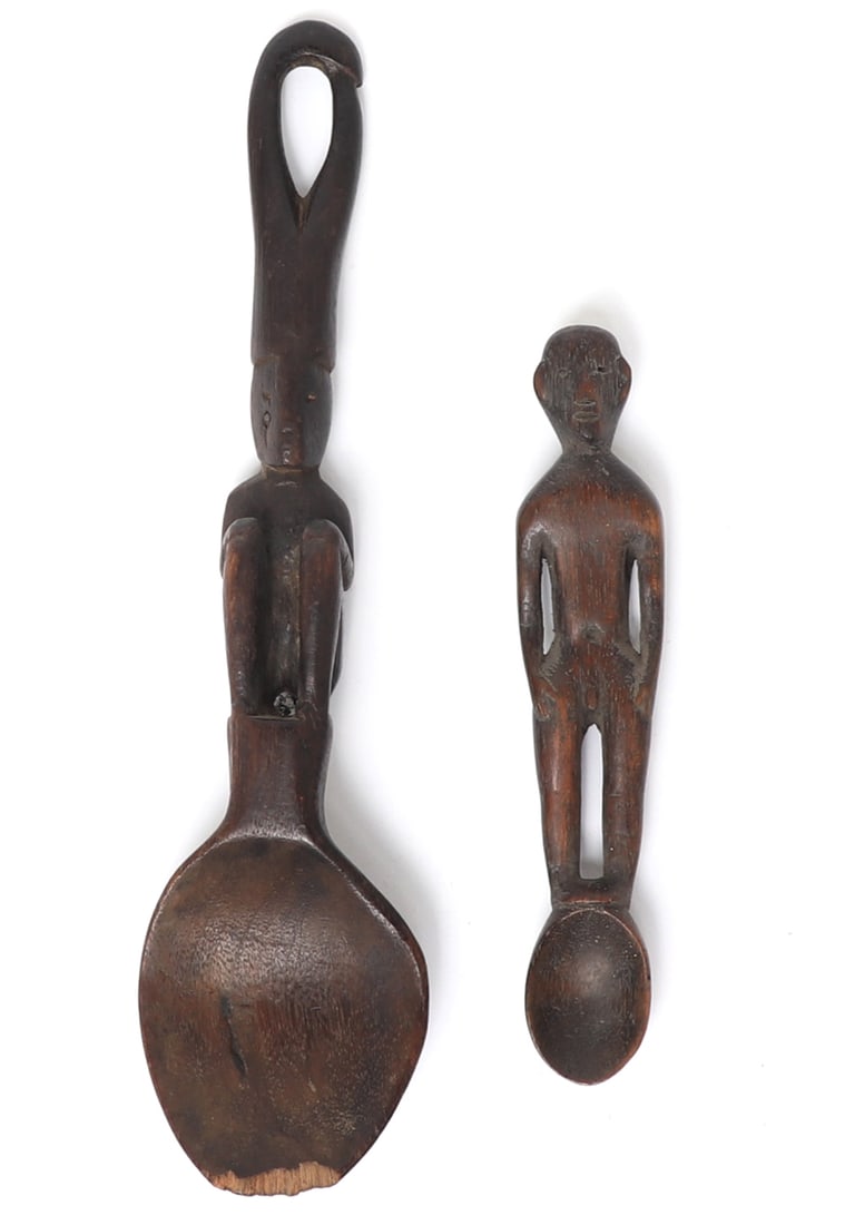 Two Philippines Ifugao Spoons: Wonderful hand carved Filipino spoons. Larger is considered a rice spoon due to size, and works well for serving an abundance of rice as one time. Smaller teaspoon is a standing Bulul rice god deity w