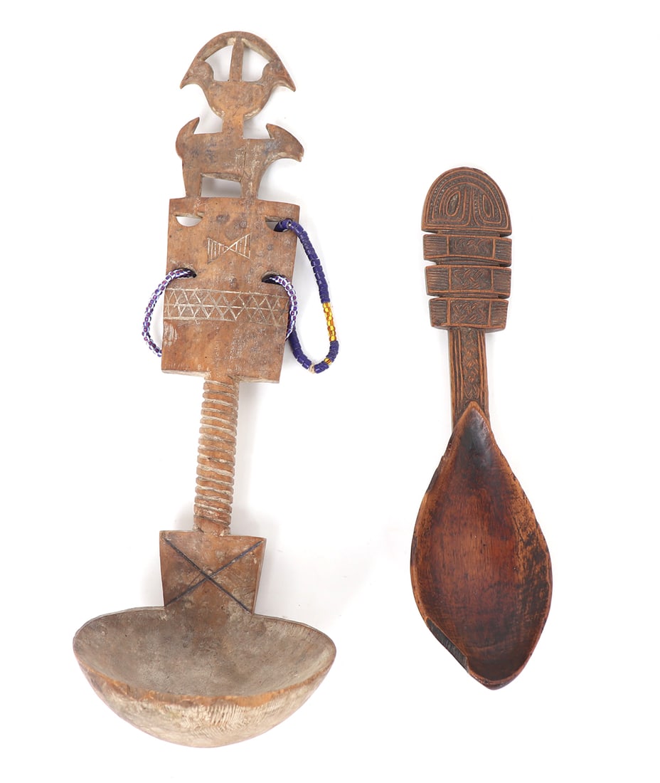 Two Tribal Wood Carved Spoons: Two early tribal spoons probably Philippines or Asante from Africa with one in a light wood color with two opposing birds over the back of an animal. size of largest 12 " L x 3 3/4"W (bowl)Ex-Oregon