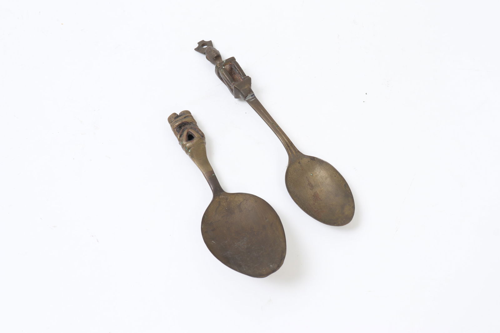Rare Ifugao Ritual Brass Spoons, Luzon 19th c.: Rare set of early cast brass spoons with King Bulul finial and pair of embracing Bulul figures. Probably Luzon Early-Mid 20th century. 7" LEx-Private California Collection