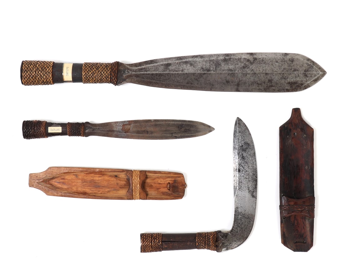 Group of Three Hinalung Knifes: Group of three Hinalung knifes / spearheads with rattan wrapped handles. Largest with a double edged blade converges at handle forming a diamond shaped guard above a wooden handle wrapped with 2 bands
