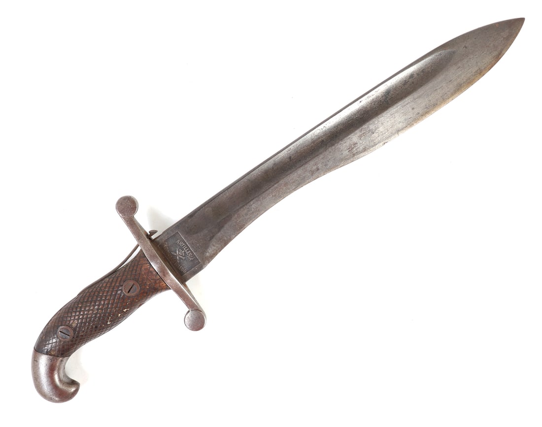 WWI Spanish 1907 Model Artillery Bolo Knife: WWI era Spanish 1907 model artillery bolo knife. Blade with double edged tip to single edge and wide fuller. Ricasso marked with "Artilleria Fabrica De Toledo" and crossed cannons beneath crown used