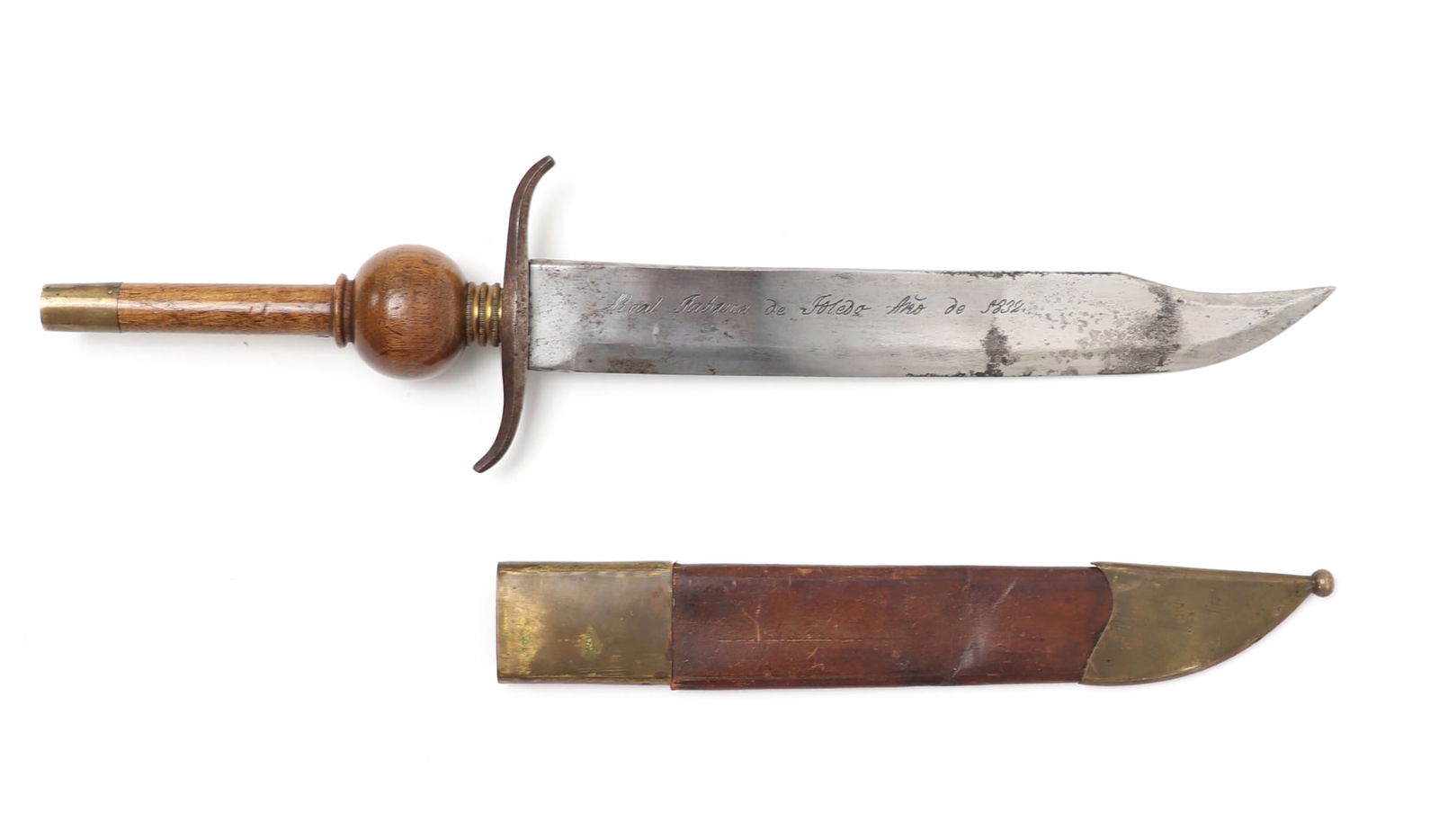 Massive Spanish Plug Bayonet, Alamo Period 1832: Massive Spanish Colonial plug bayonet with engraved bowie knife blade engraved by Toledo 1832 with scabbard. Blade engraved - Real Fabrica de Toledo, Ano de 1832. Wood carved plug with brass caps and