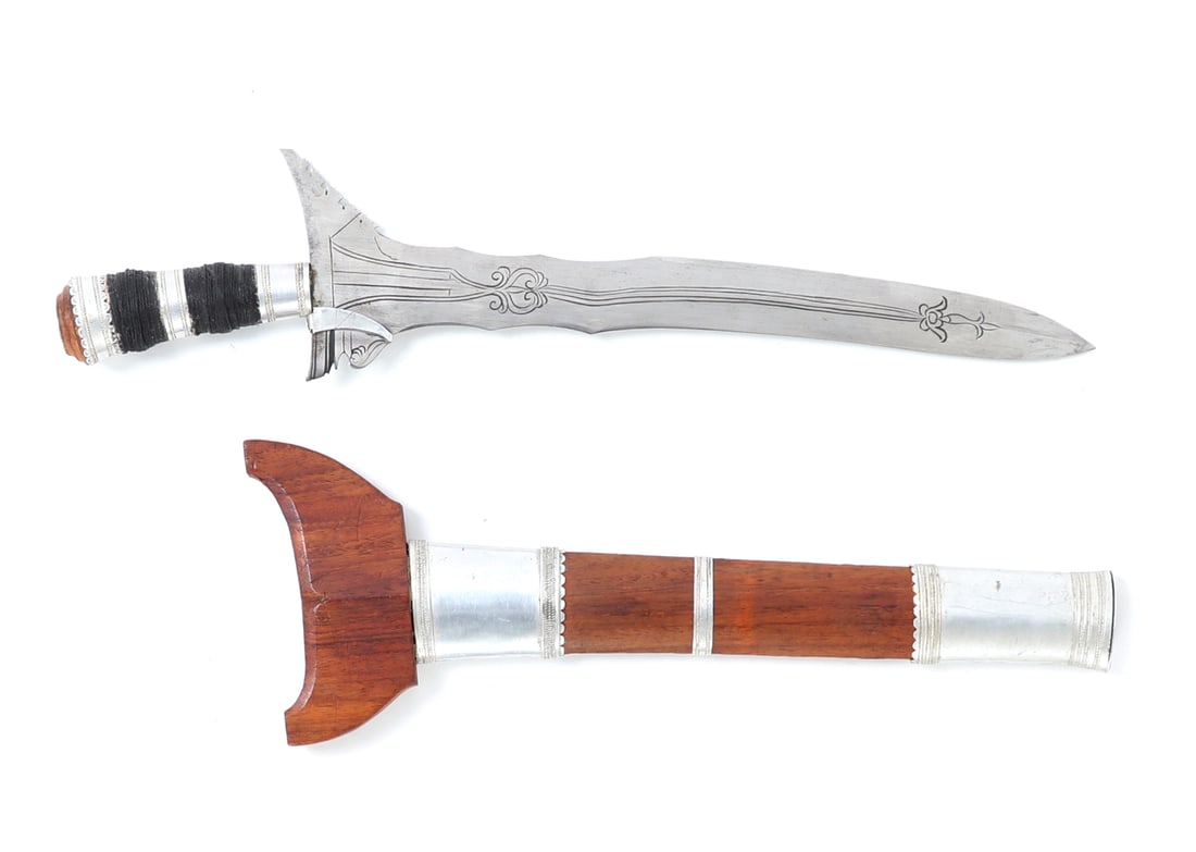 Filipino Modern Vintage Moro Kris & Scabbard: Philippine's vintage five wave blade Moro kris with a maple wood colored scabbard. Blade incised beautifully throughout. Handle tightly wrapped in a silk style thread with silvered rings. Kris blades