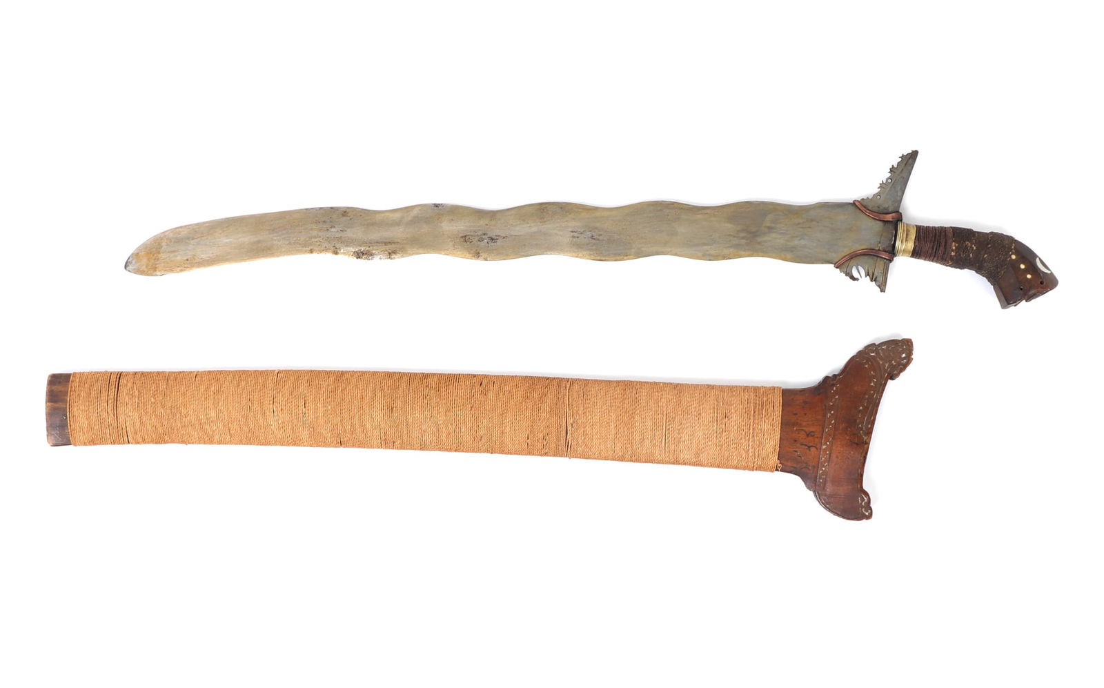 Philippines Moro Kris Sword & Scabbard: Moro Kris sword and scabbard with fine 8-wave blade and handle inset with mother of pearl decoration. Double edged blade with straight tip leading to 8 waves. Hilt secured with asang-asang copper band