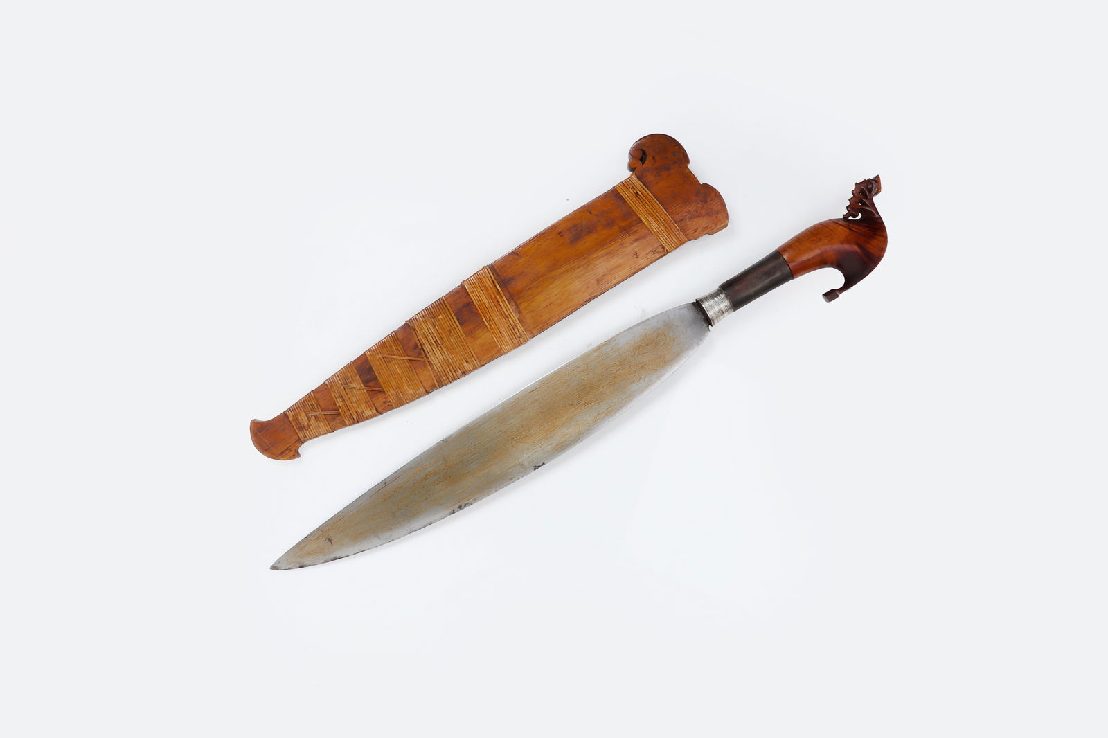 Moro Carabao Horn Barong & Datto Pommel: Moro Barong Datto Pommel w/Rare Carabao Sleeve, circa 1800s. Scabbard in a light colored wood with blonde rattan wrapping. Grip with collar to base. 24" Overall