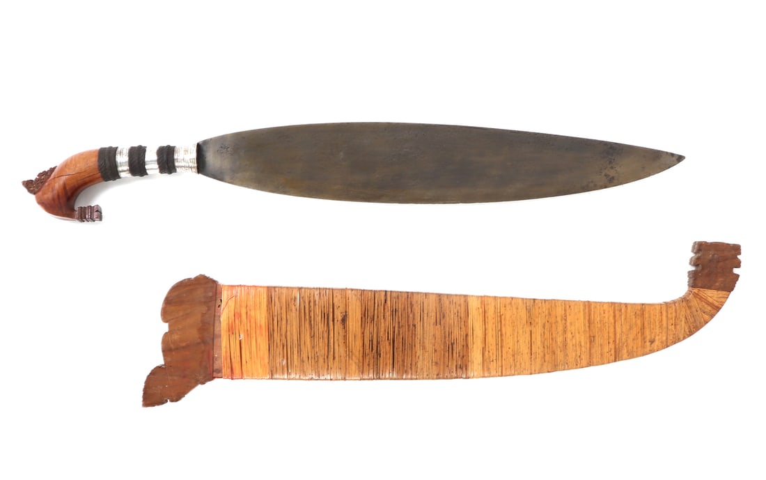 Philippines Moro Barong w/ Scabbard & Thick Blade: Filipino Moro barong sword with rattan wrapped wooden sheath. Heavy blade which is over 1/4" thick at thickest part is typical single edged leaf form. Handle with alternating silver and braided wrap b