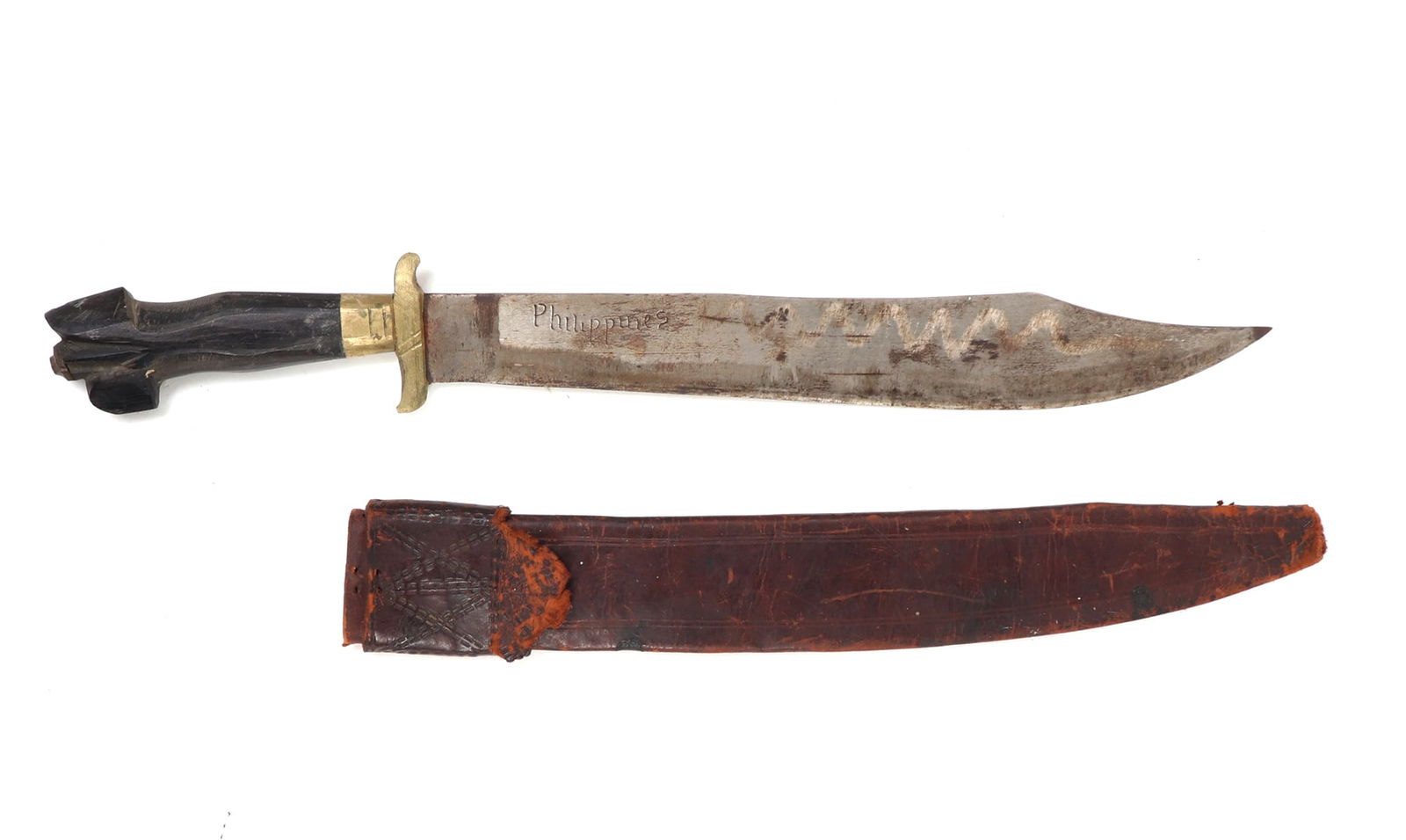 Philippines Negrito Bolo Sword & Sheath: Philippines Archipelagos, negrito bolo sword with sheath, circa mid 20th century. Single edge blade with curved tip and incised to the blade "PHILIPPINES". Guard in gilt brass. Carabao horn handle wit