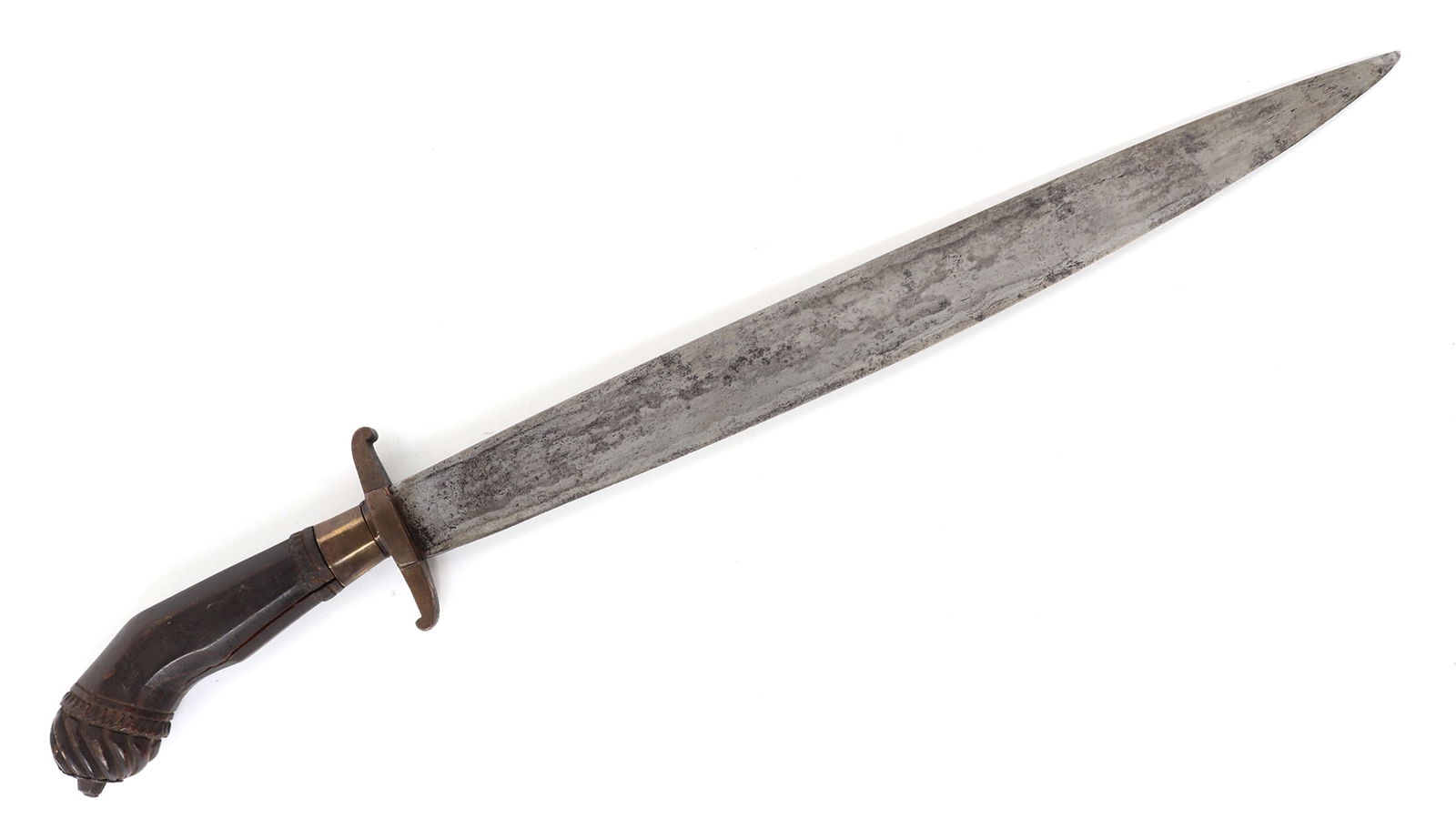 Philippines Katipunan / Revolution Period Sword, Late 1800's: Philippines Archipelago, Katipunan, Revolution Period. Traditional sword with a very thick single edge blade, late 19th century. Guard in thick brass with straight quillion that feature a short turn i