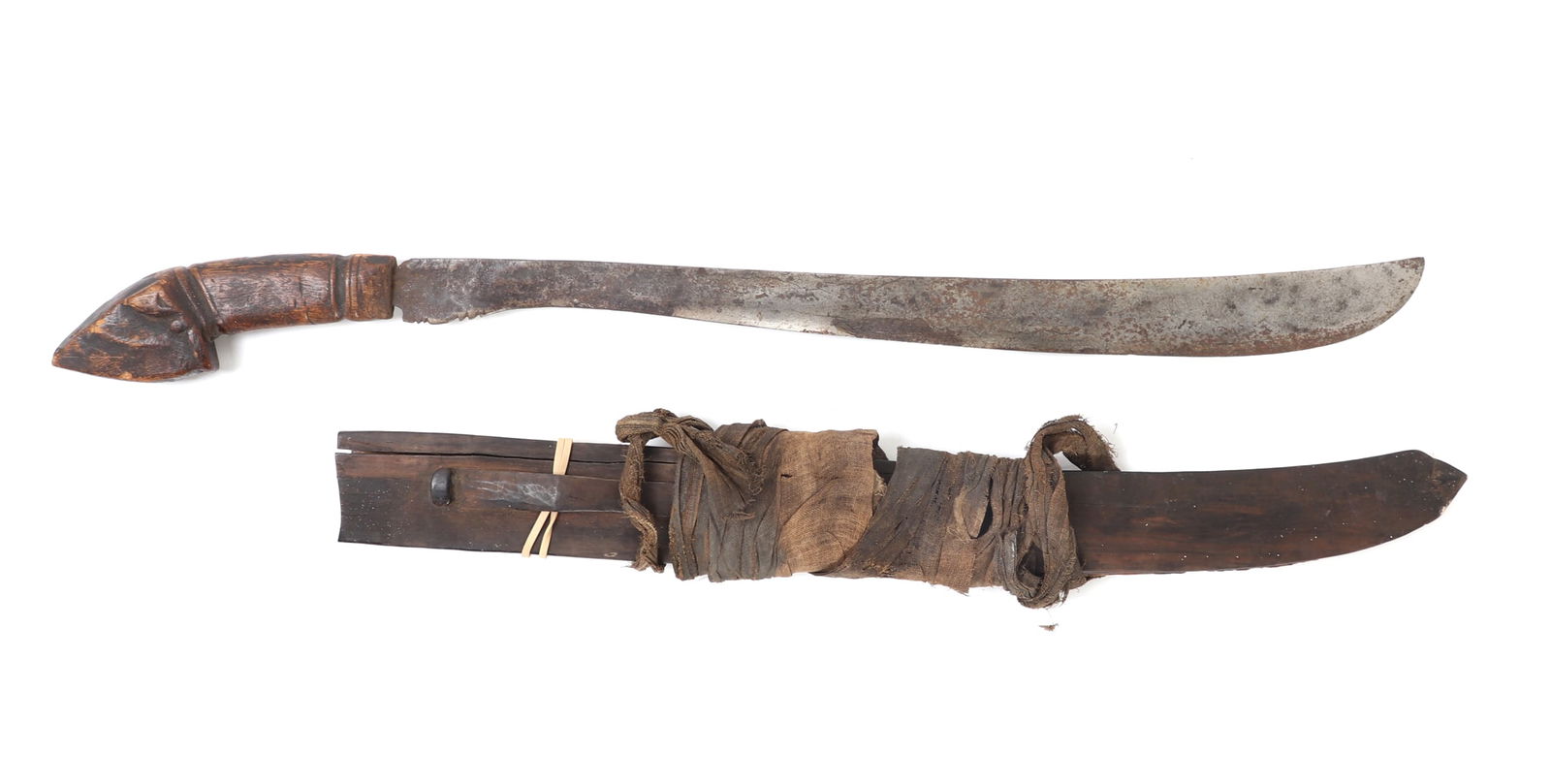 19th C. Philippines Bicol Minasbad Sword: 19th c. Bicol Minasbad with wood sheath. Single edged blade with wide tip and forward sloping blade leading to a chiseled edge design near the hilt. Blades spine nearly 1/2" thick at thickest section.
