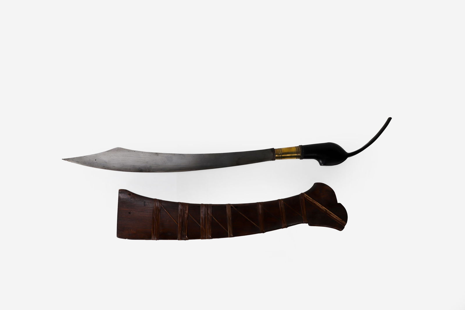 Very Rare Moro Yakam Pira, Carabao Handle: Moro Yakam Pira Carabao Long Horn Pommel and nearly perfect condition scabbard. First Quarter of the 20th century. Very fine and Rare example of a quinticential collectors sword with few equal example